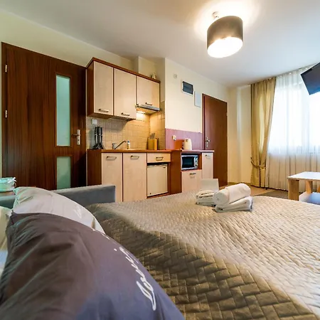 Проживание в семье Villa Martii - Komfortowe Apartamenty Z Aneksami Kuchennymi - Spokojna Okolica, Blisko Plazy *