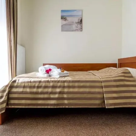 Проживание в семье Villa Martii - Komfortowe Apartamenty Z Aneksami Kuchennymi - Spokojna Okolica, Blisko Plazy